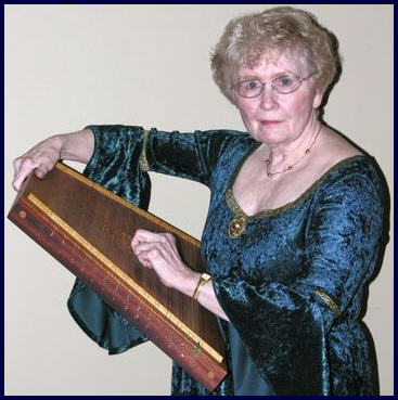 Barbara with her psaltery.