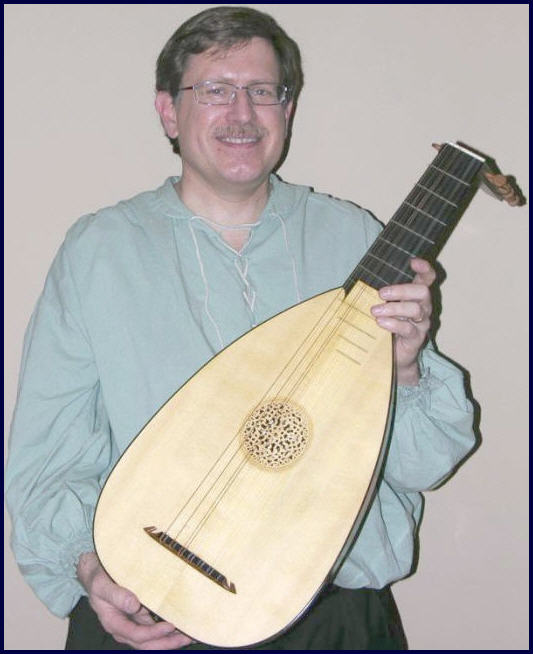 John with one of his lutes.